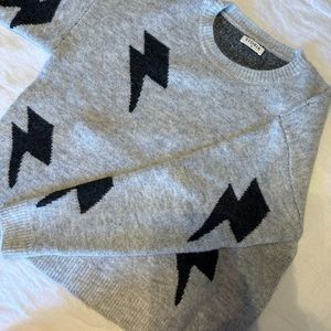 Super-soft lightening bolt sweater. Gray and black, size Medium.